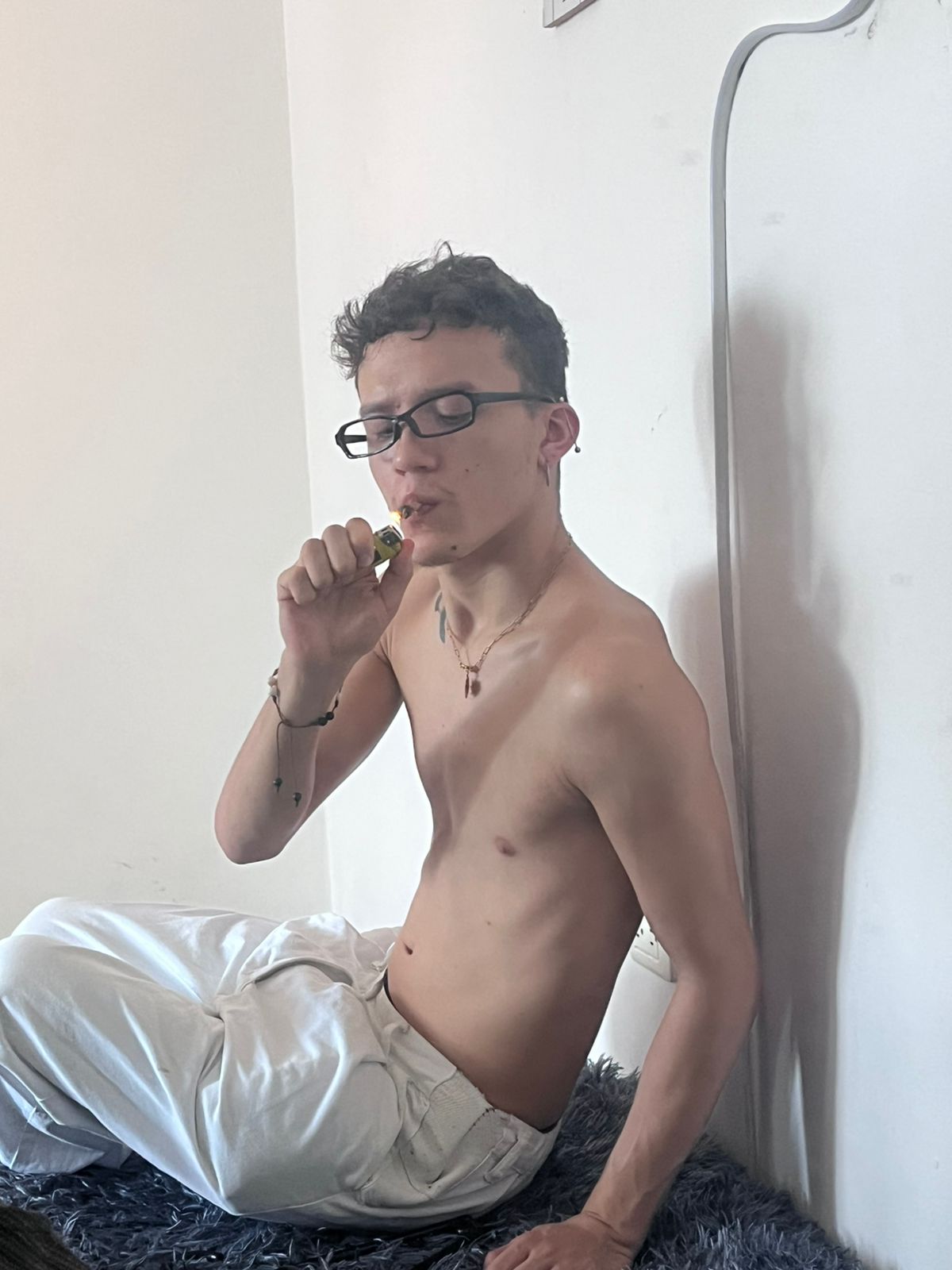 Patrick smiling with nightclub glow